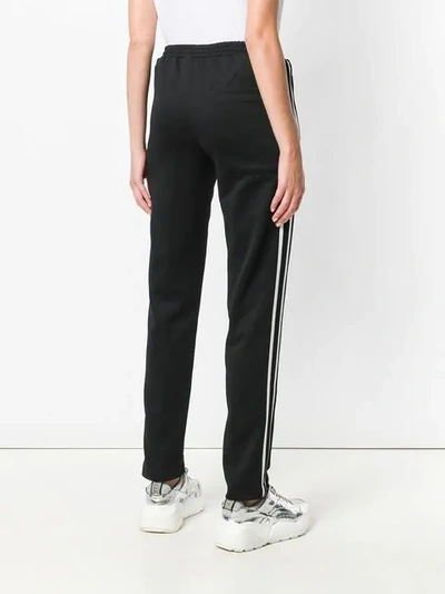 Shop Moncler Slim Fit Track Pants In Black