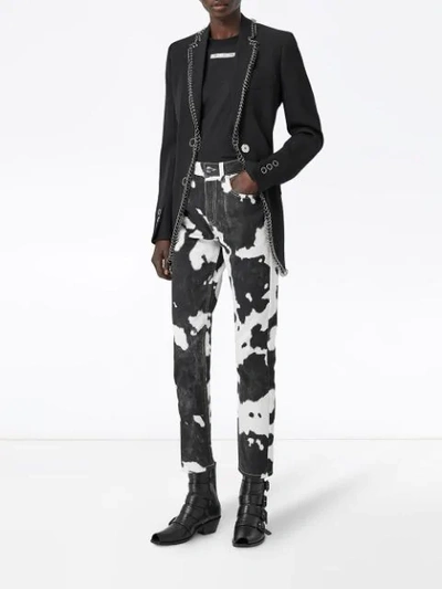 Shop Burberry Straight Fit Cow Print Jeans In Black