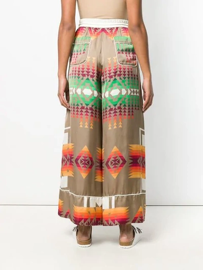 Shop Sacai Geometric Print Trousers In Brown