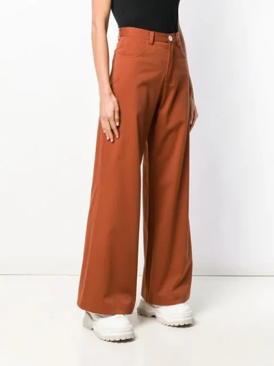 Shop Société Anonyme Paulette Wide Leg Trousers In Orange