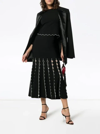 Shop Alexander Mcqueen High Waist Fitted Flared Cutout Skirt In Black