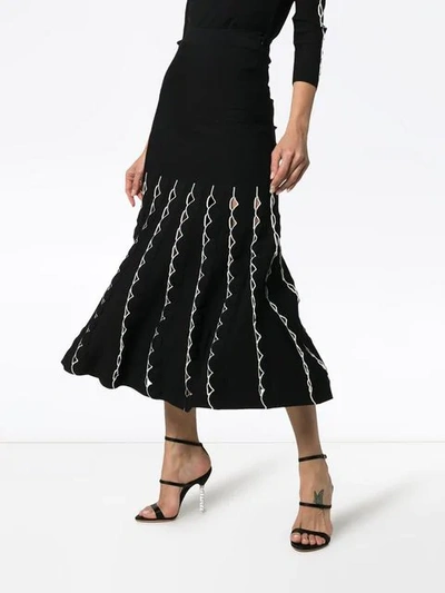 Shop Alexander Mcqueen High Waist Fitted Flared Cutout Skirt In Black