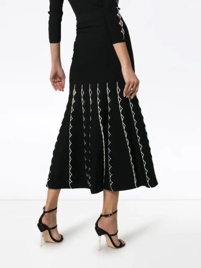 Shop Alexander Mcqueen High Waist Fitted Flared Cutout Skirt In Black