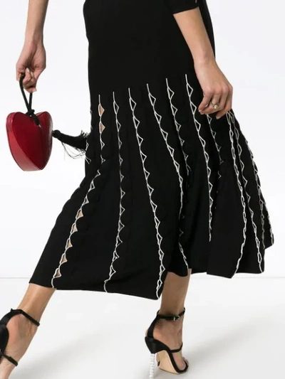 Shop Alexander Mcqueen High Waist Fitted Flared Cutout Skirt In Black