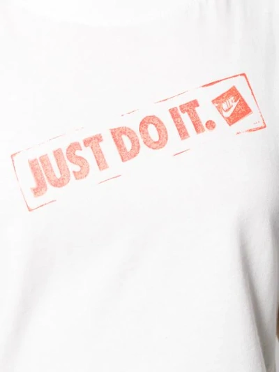 Shop Nike Cropped Slogan Stamp T-shirt - White