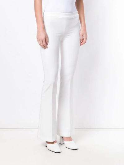 Shop Blanca Flared Trousers In White