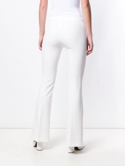 Shop Blanca Flared Trousers In White