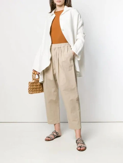 Shop Apuntob Loose Fit Tapered Trousers - Neutrals