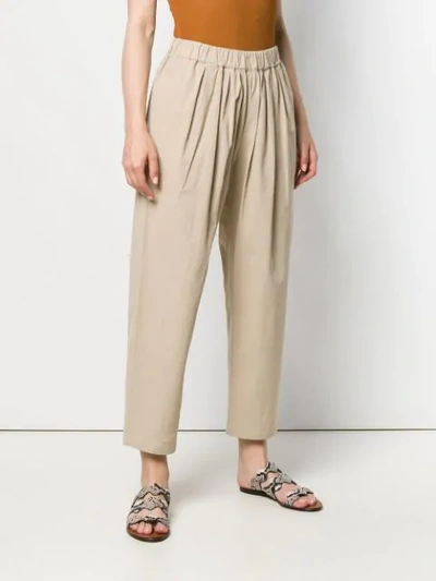 Shop Apuntob Loose Fit Tapered Trousers - Neutrals