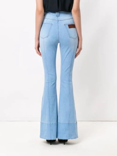 Shop Amapô Verona Flared Jeans In Blue