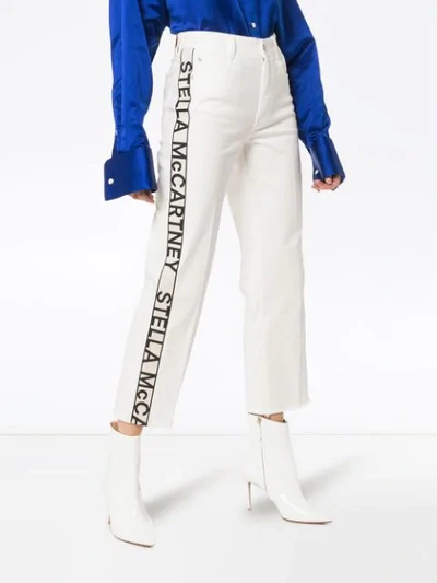 Shop Stella Mccartney Logo Strip Cropped Jeans In White