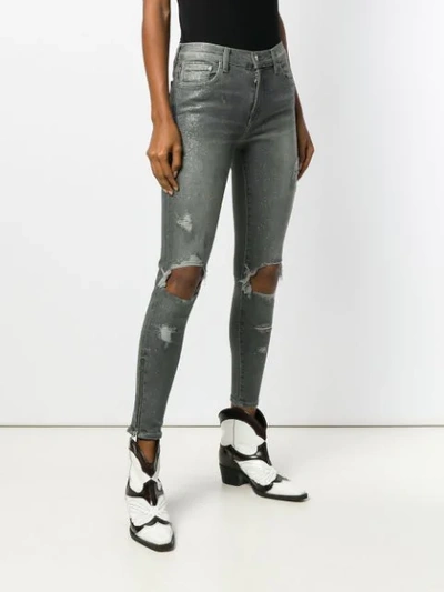 Shop Amiri Distressed Paint Effect Jeans In Grey