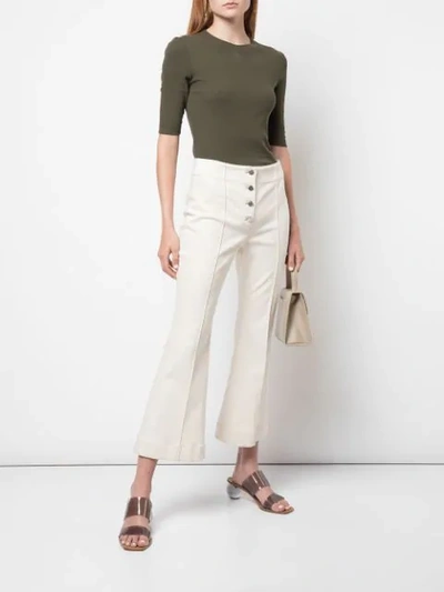 Shop Rosetta Getty Cropped Flare Jeans In White