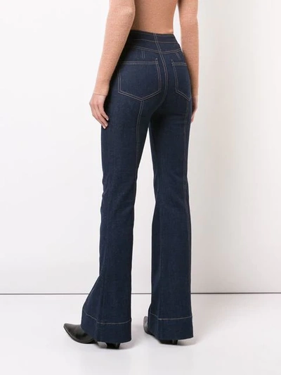 Shop Ulla Johnson Flared Jeans In Blue