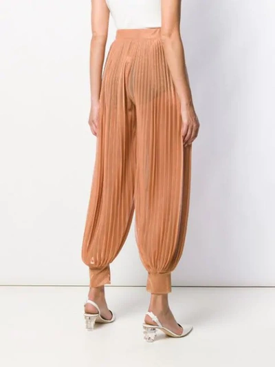 Shop Atu Body Couture Pleated Harem Trousers In Orange