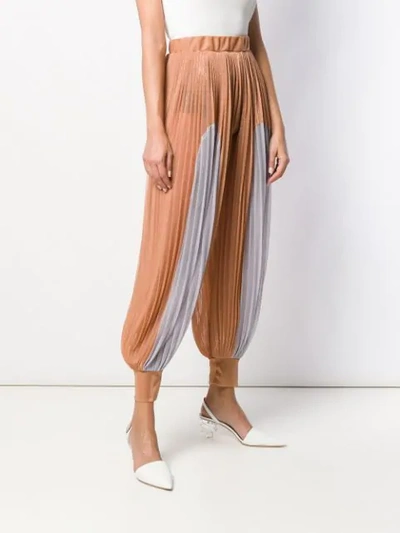 Shop Atu Body Couture Pleated Harem Trousers In Orange