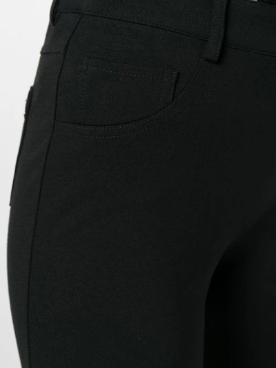 Shop Blumarine Flared Trousers In Black