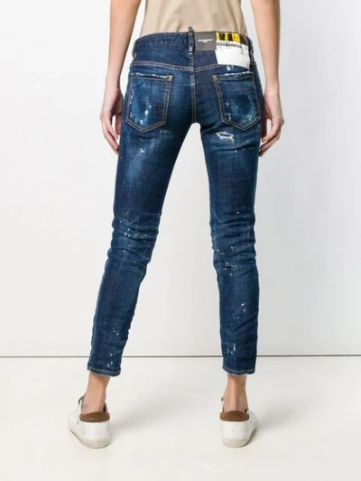 Shop Dsquared2 Paint Splattered Skinny Jeans In Blue