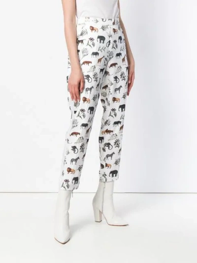 Shop Victoria Beckham Cropped Safari Print Trousers - White