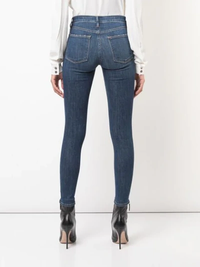 Shop Frame Skinny Cropped Jeans In Blue