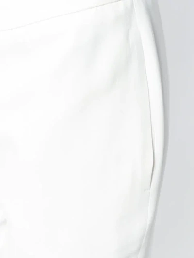 Shop Alexander Mcqueen Kickback Trousers In White