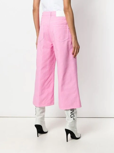 Shop Msgm Cropped Wide Leg Jeans In Pink