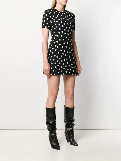 Shop Saint Laurent Polka-dot Mini Dress In Black