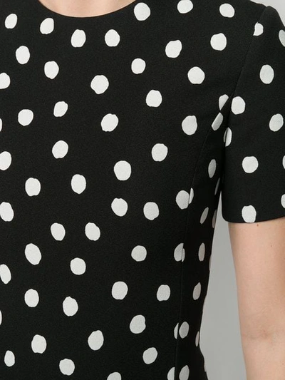 Shop Saint Laurent Polka-dot Mini Dress In Black