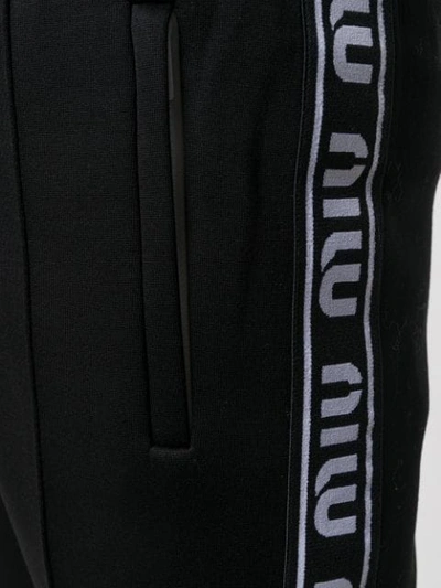Shop Miu Miu Side Logo Track Pants In F0002 Nero