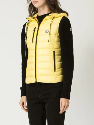 Shop Moncler Padded Hooded Waistcoat In Yellow