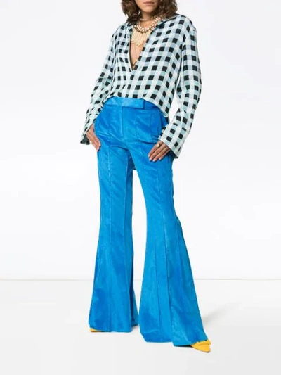 Shop Rosie Assoulin Corduroy Pleated Flare Trousers In Blue