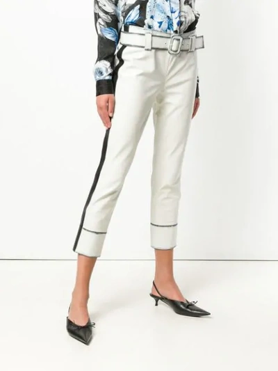 Shop Prada Cropped Calf Leather Trousers In White