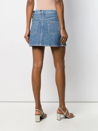 Shop Simon Miller Mini Denim Skirt In Blue