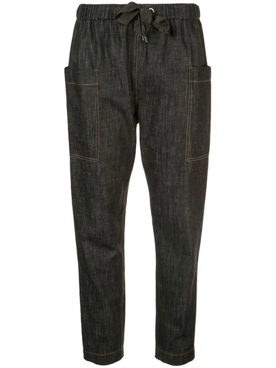 Shop Brunello Cucinelli Tapered Denim Style Trousers In Black