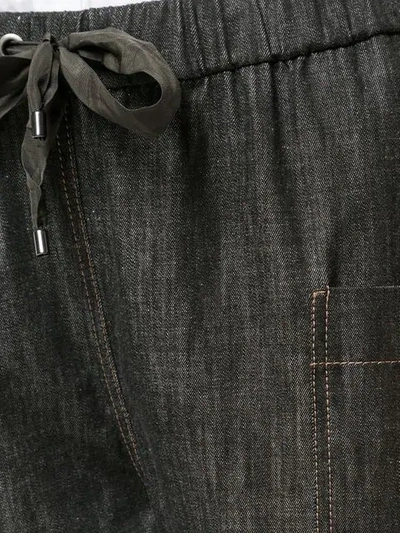 Shop Brunello Cucinelli Tapered Denim Style Trousers In Black