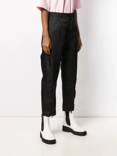 Shop Prada Cropped-hose Mit Reissverschlüssen - Schwarz In Black