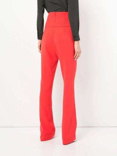 Shop Semsem High Waisted Flared Trousers In Red