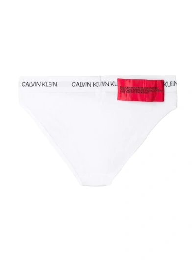 Shop Calvin Klein Logo Band Briefs In 100 White