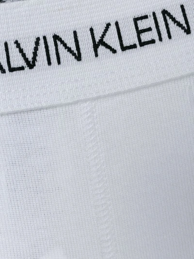 Shop Calvin Klein Logo Band Briefs In 100 White