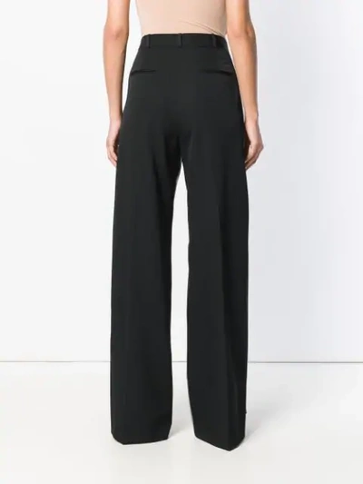 Shop Stella Mccartney Two-tone Flared Trousers In Black