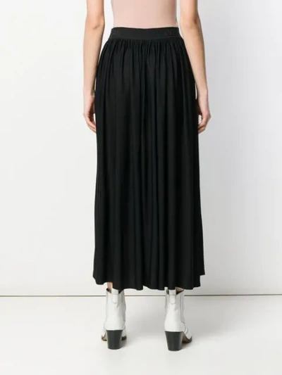 Shop Msgm Pleated Long Skirt In Black