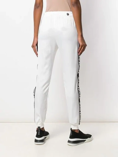 Shop Philipp Plein Side Logo Stripe Track Pants In White
