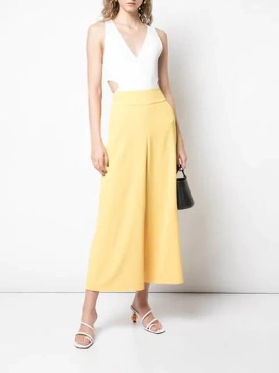 Shop Alice And Olivia Cropped Wide Leg Trousers In Yellow