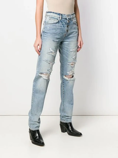 Shop Amiri Distressed Boyfriend Jeans In Blue