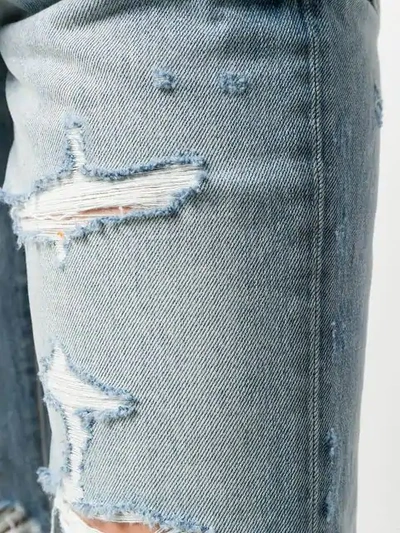 Shop Amiri Distressed Boyfriend Jeans In Blue