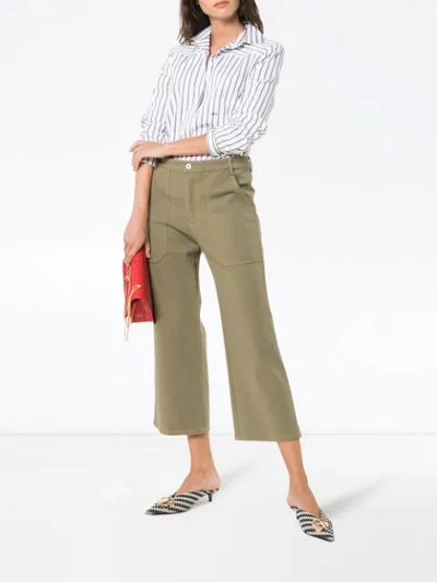 Shop Miu Miu Mid Rise Studded Cropped Wide-leg Jeans In Green