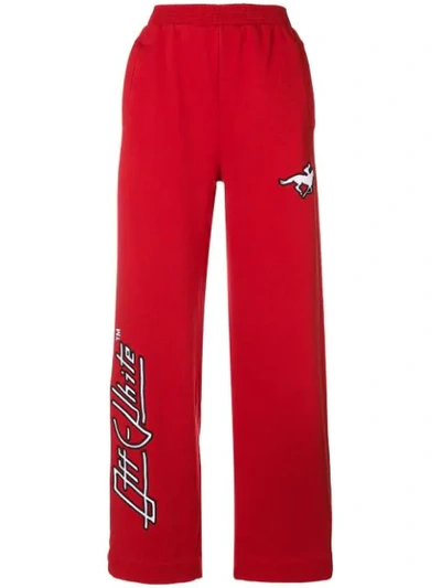 high-waisted track trousers