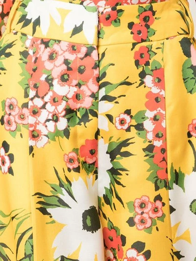 Shop Carolina Herrera Floral Print Flared Trousers In Yellow