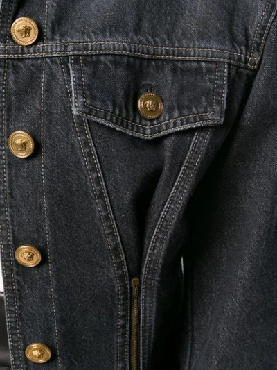 Shop Versace Stud Detailed Denim Jacket In Black