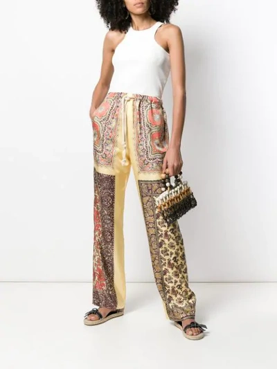 Shop Etro Paisley Printed Palazzo Trousers In Yellow